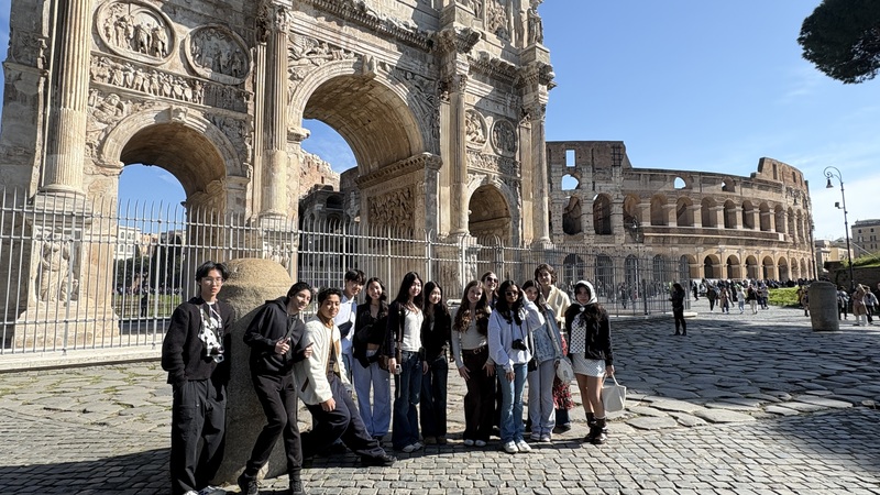 Young adults posing outdoors in Europe