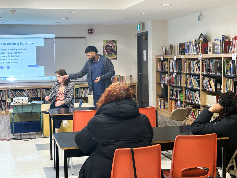 Photo of parents listening to Mr. Persad and Ms. Harispuru's presentation