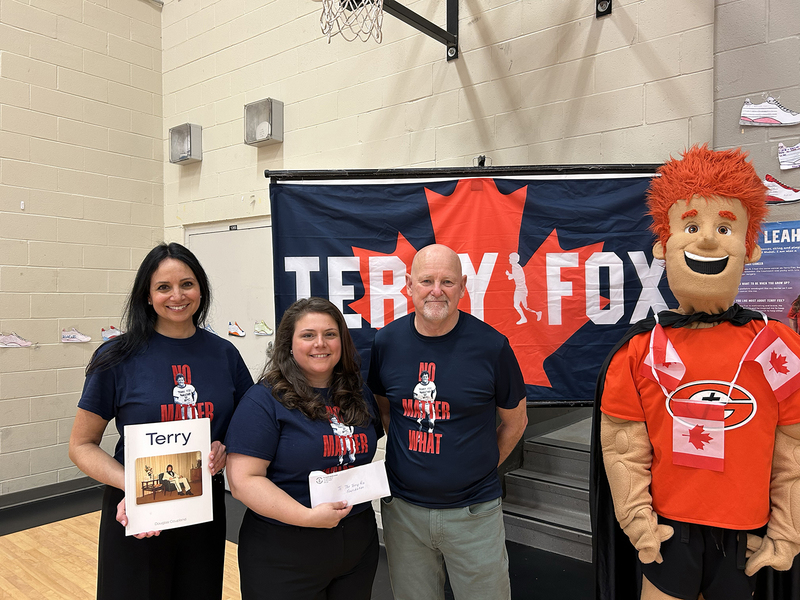 Photo of Fred Fox with St. Andre staff