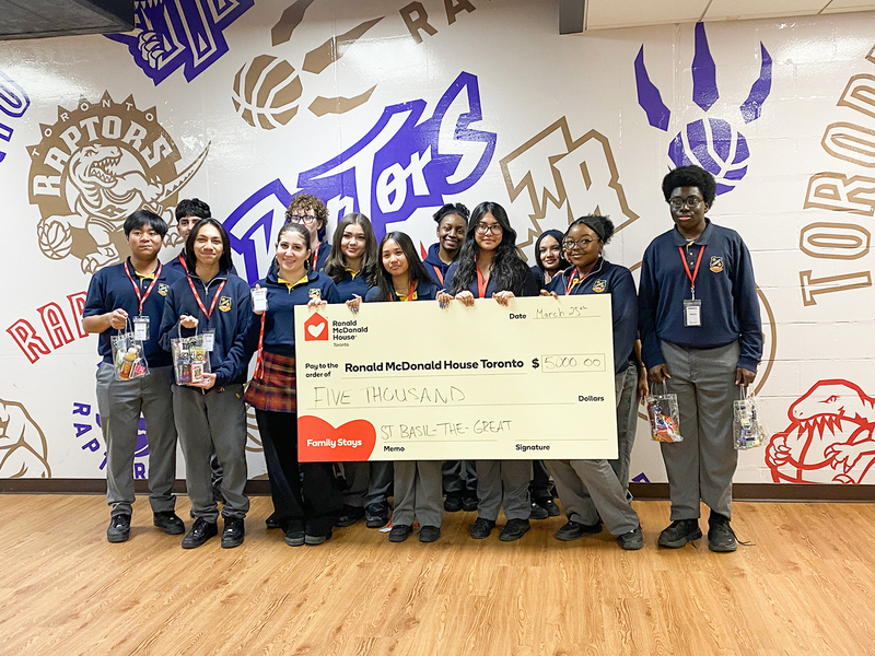 Group photo of St. Basil-the-Great students with their grant cheque