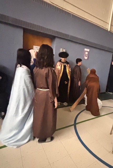 Photo of Blessed Trinity students performing the Stations of the Cross