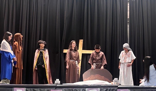 Photo of Blessed Trinity students performing the Stations of the Cross