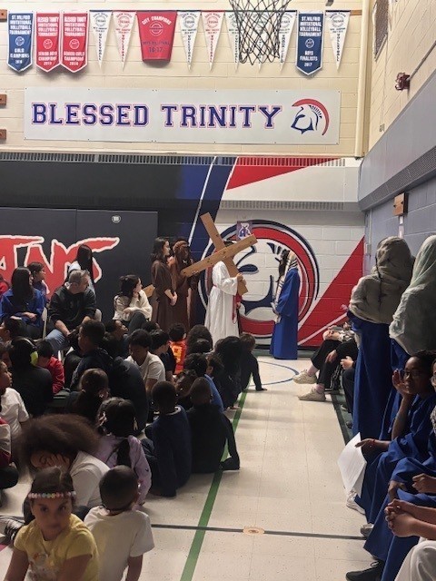 Photo of Blessed Trinity students performing the Stations of the Cross