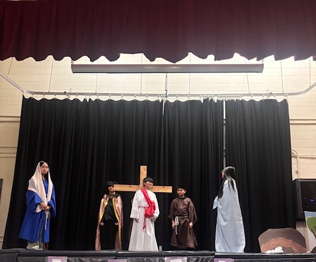 Photo of Blessed Trinity students performing the Stations of the Cross