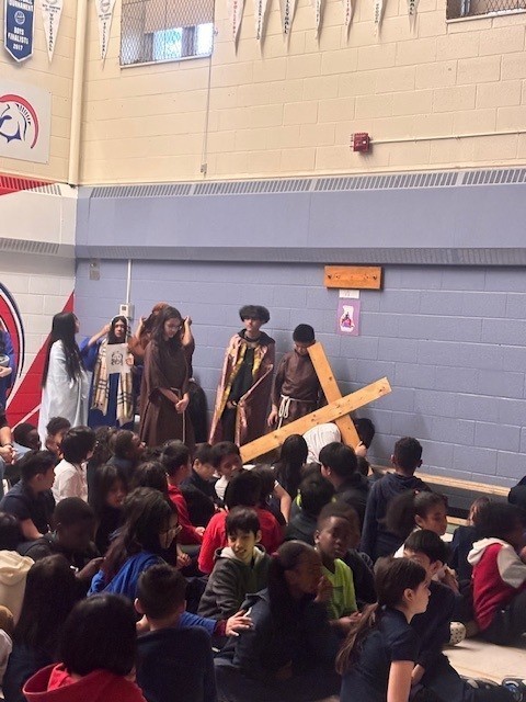 Photo of Blessed Trinity students performing the Stations of the Cross