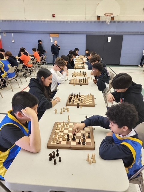 Blessed Trinity students playing chess at the tournament