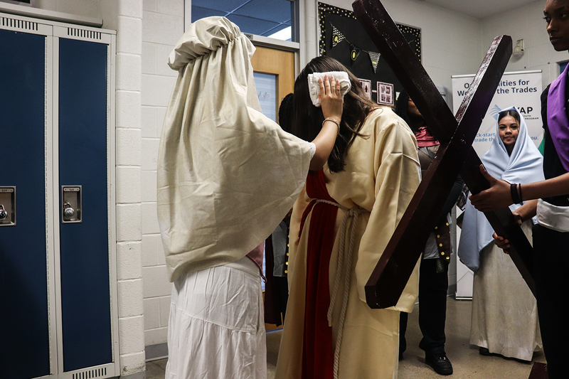 Photo of Loretto College students performings the Stations of the Cross