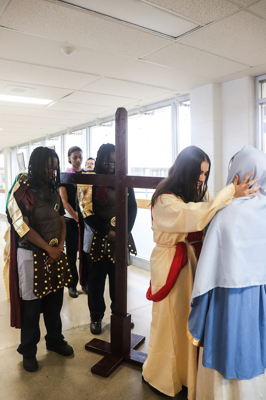 Photo of Loretto College students performings the Stations of the Cross
