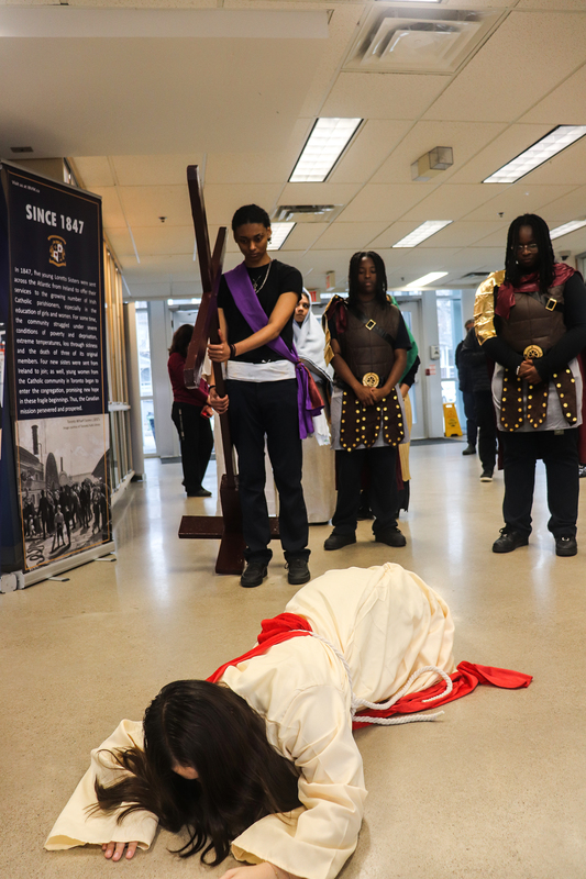 Photo of Loretto College students performings the Stations of the Cross