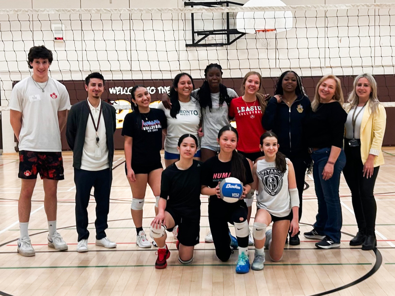 Group photo of SJCS students and staff with Mason