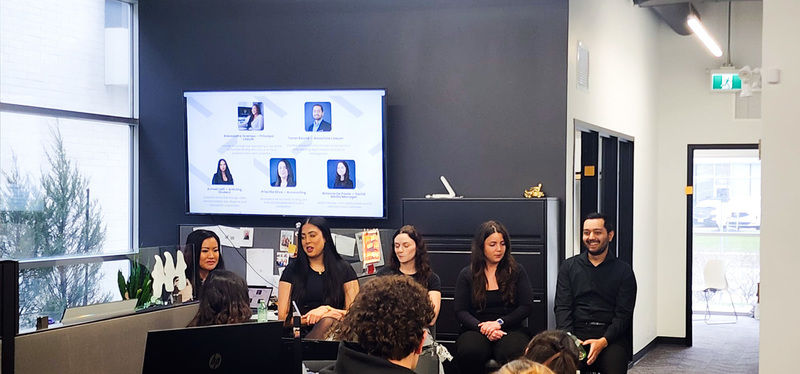 Photo of MPSJ students discussing together at Vantage Law