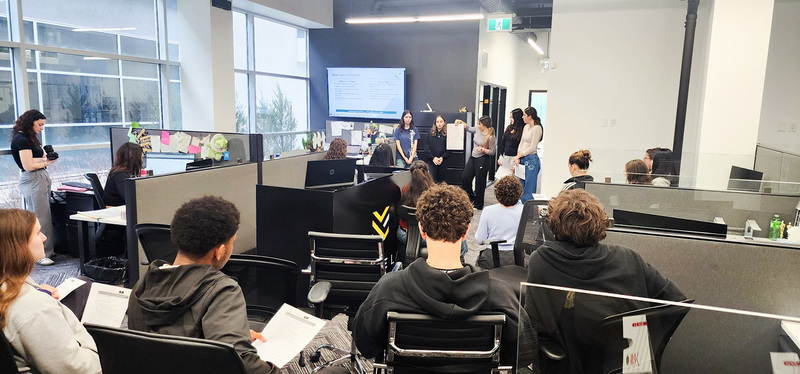 Photo of MPSJ students discussing together at Vantage Law