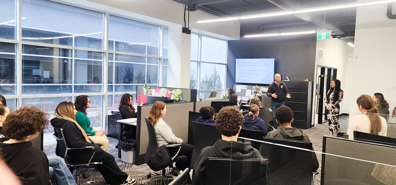 Photo of MPSJ students discussing together at Vantage Law