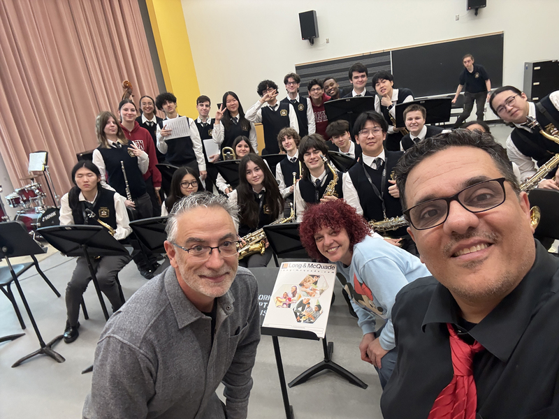 Group photo of Bishop Allen Academy band with their teachers