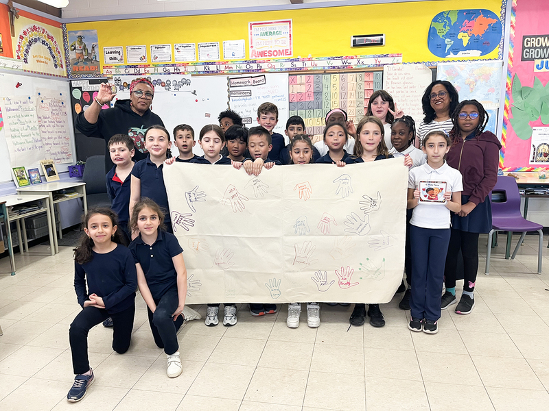 Group photo of students with Ms. Balthazaar