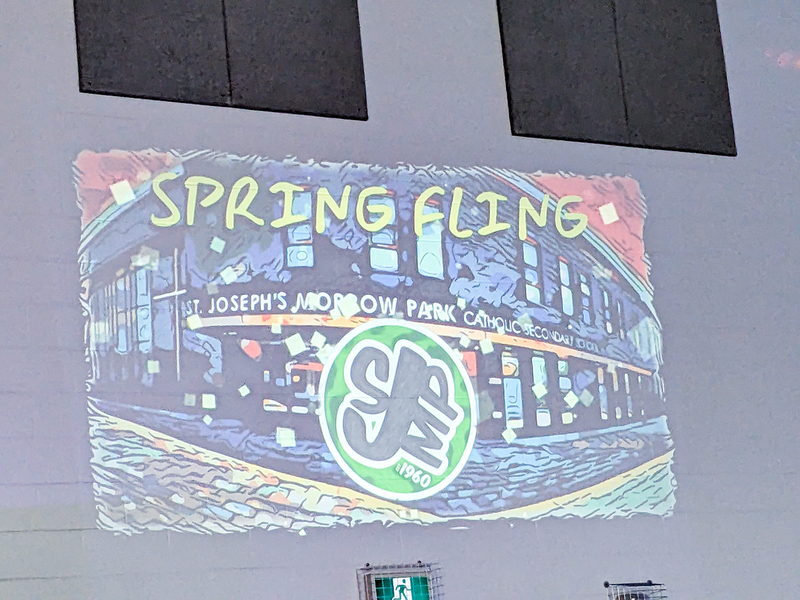 Photo of the presentation screen showing spring fling