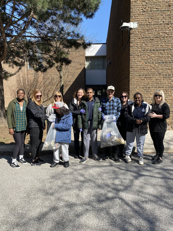 Photo of SJOA students with the garbage they cleaned up