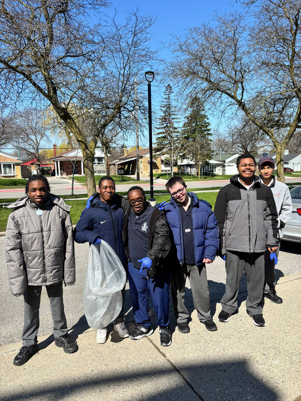 Photo of SJOA students with the garbage they cleaned up
