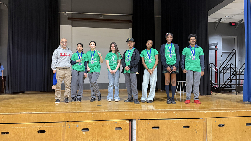 Photo of students in their team colours during the event
