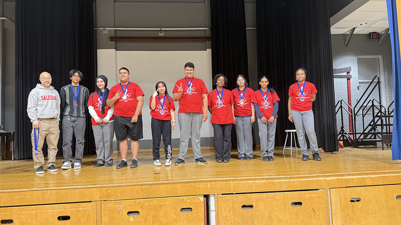 Photo of students in their team colours during the event