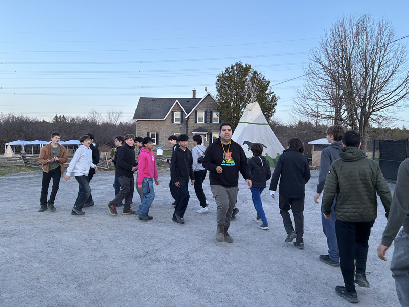 Students participating in a traditional&nbsp; dance at Mādahòkì&nbsp;Farm.