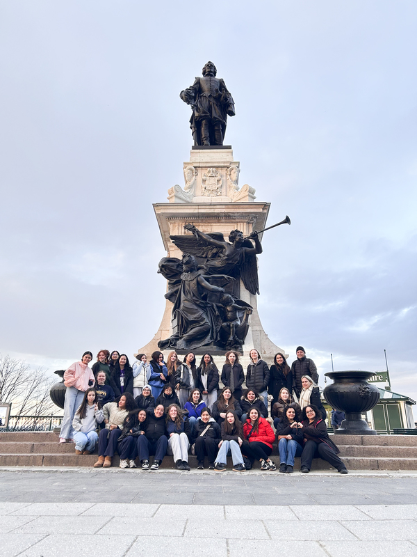 Photo of SJCS students and staff in front of historical building in Quebec
