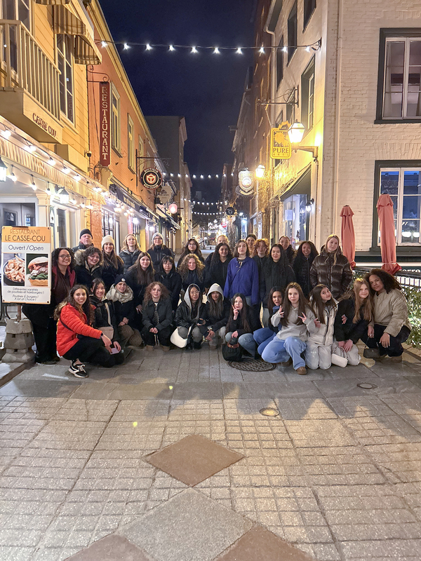 Photo of SJCS students and staff in front of historical building in Quebec