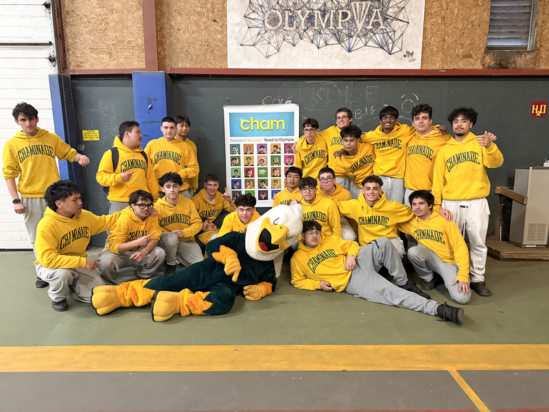 Group photo of Chaminade students along with the school mascot at the retreat