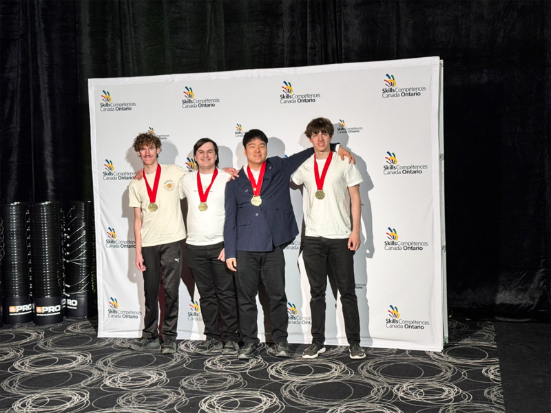 Group photo of the MPSJ Robotics team with their gold medals