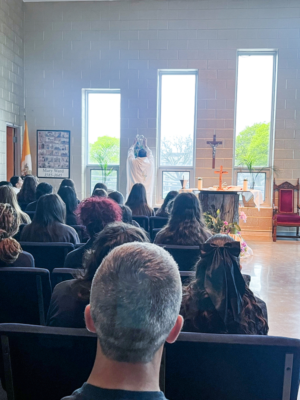 Photo of attendees seated during the Mass while Mary is crowned