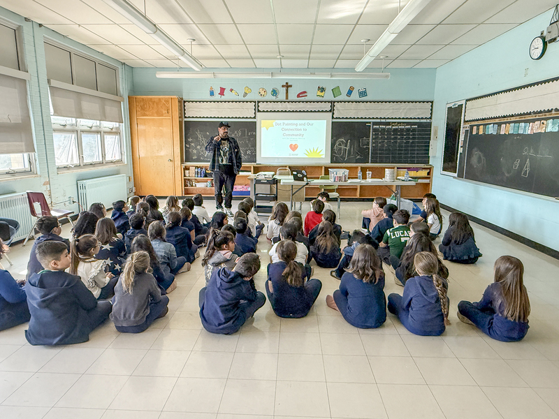 Photo of St. John Bosco students listening to Jason and his presentation