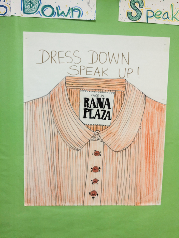 Bulletin board display explaining the initiative with accompanying artwork