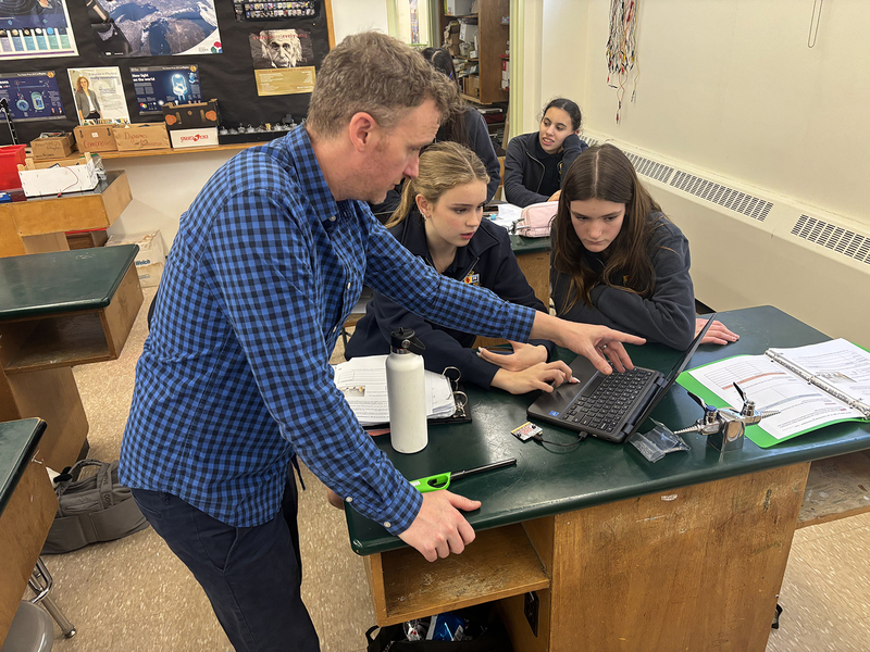 Collage of three photos of SJCS students working on their project with the help of their teacher