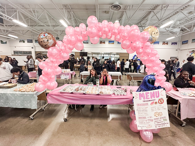 Photo of JCM students with their wares at the marketplace