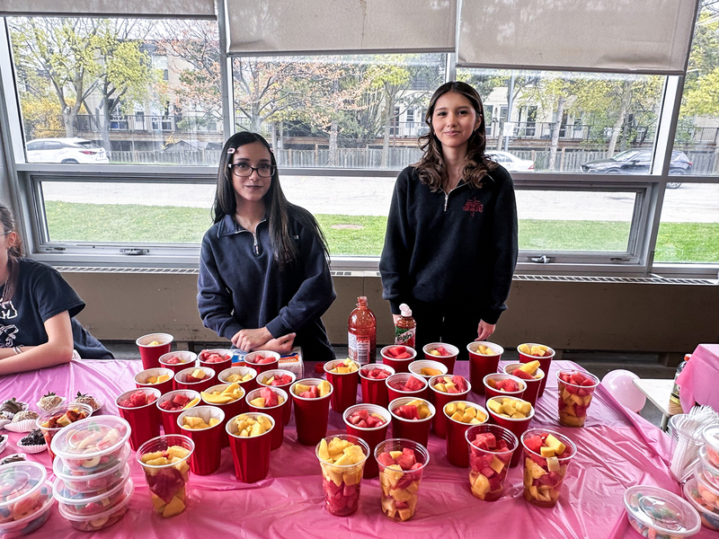 Photo of JCM students with their wares at the marketplace