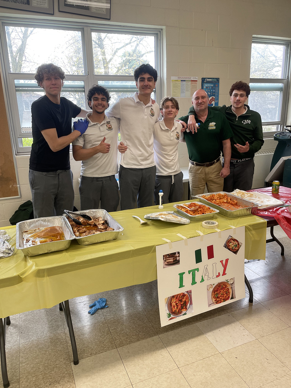 Photo of Chaminade students and staff at the Italy cultural table