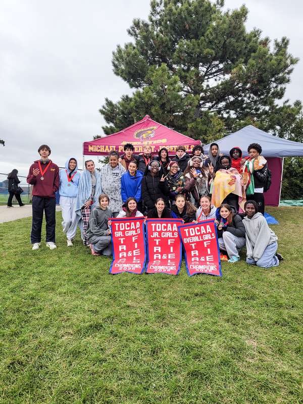 Group photo of MPSJ athletes with their medals