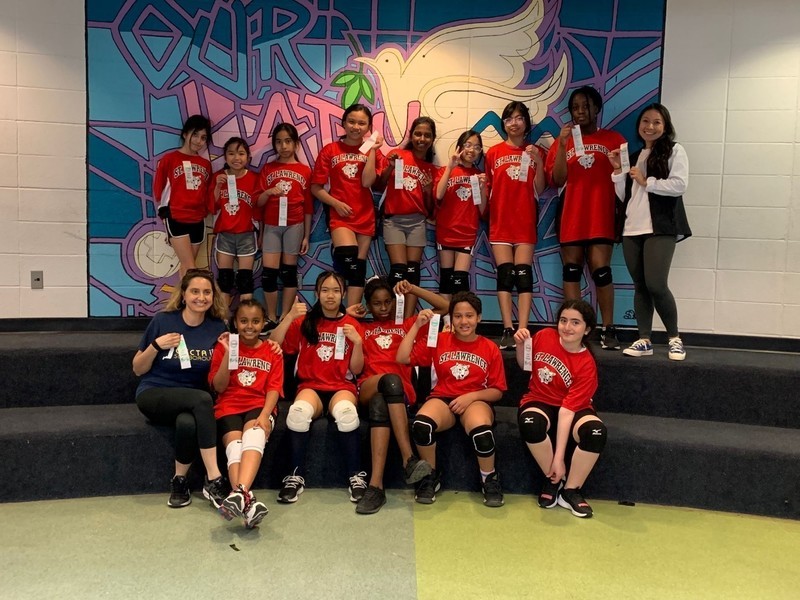 Photo of the St. Lawrence girls sports team holding up their ribbons Photo of the St. Lawrence girls sports team holding up their ribbons