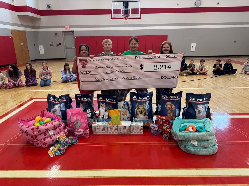 Group of students with check for the Jefferson County Humane Society
