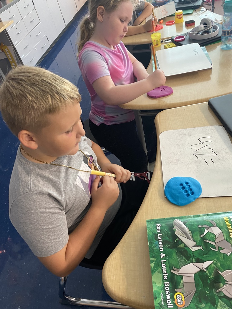 Student playing with play-goh