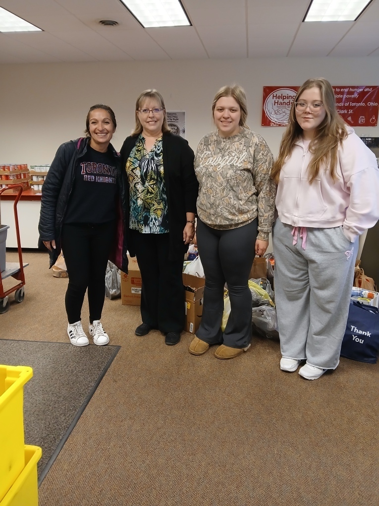 Teacher and Workers at food pantry