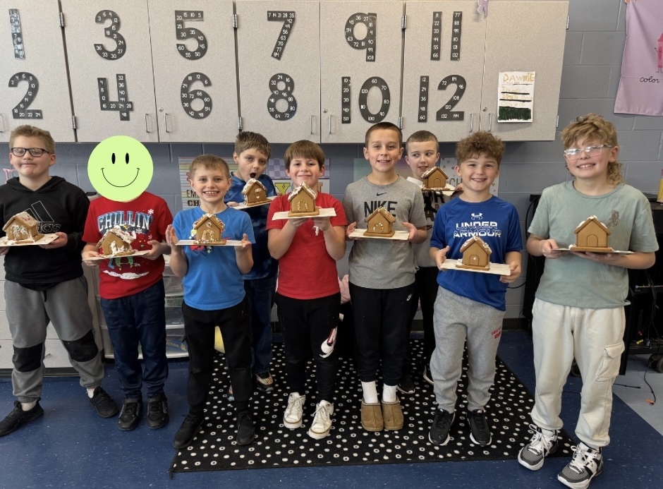 students with gingerbread houses