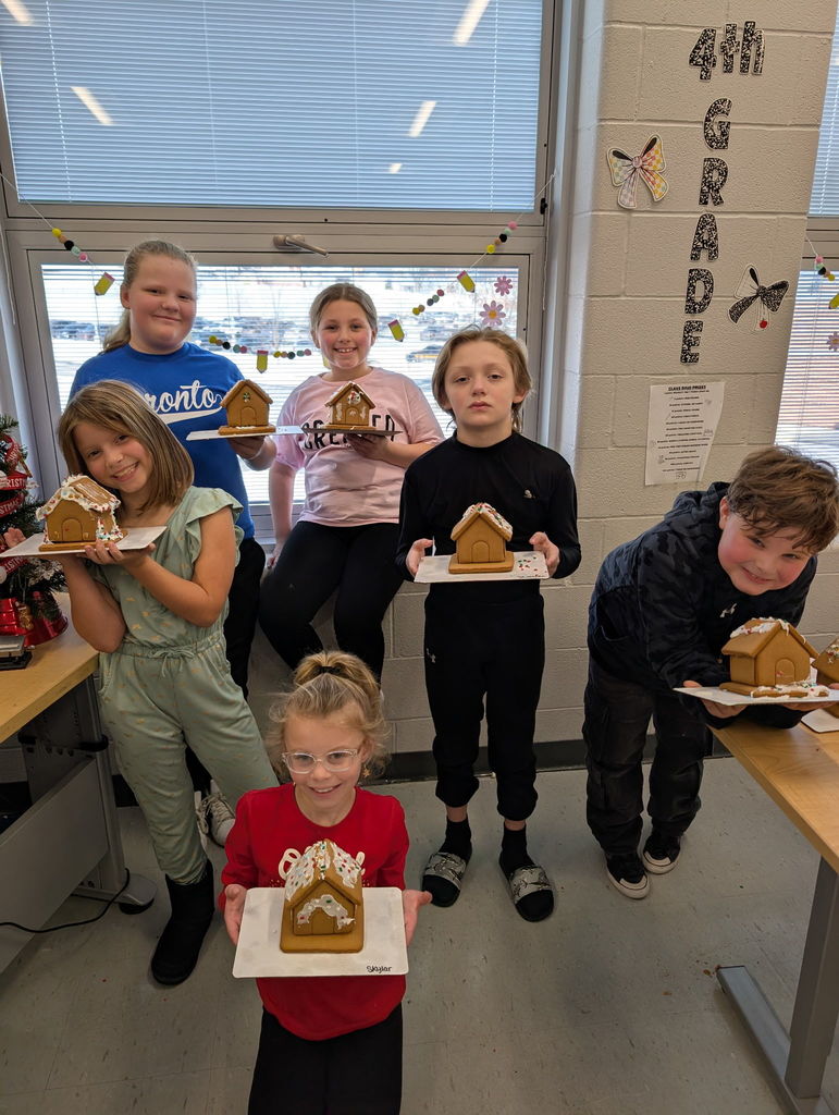 students with gingerbread houses