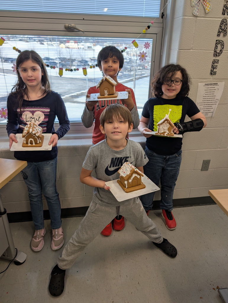 students with gingerbread houses