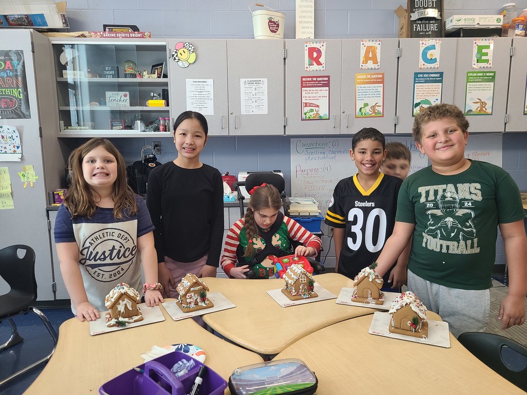 students with gingerbread houses