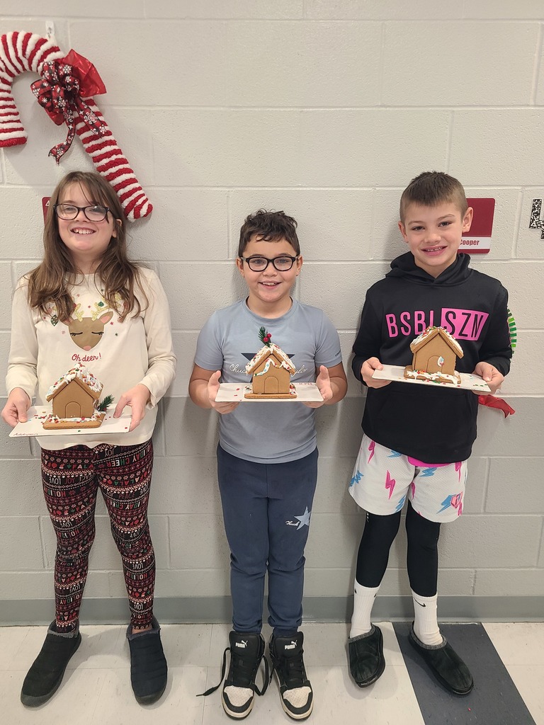 students with gingerbread houses