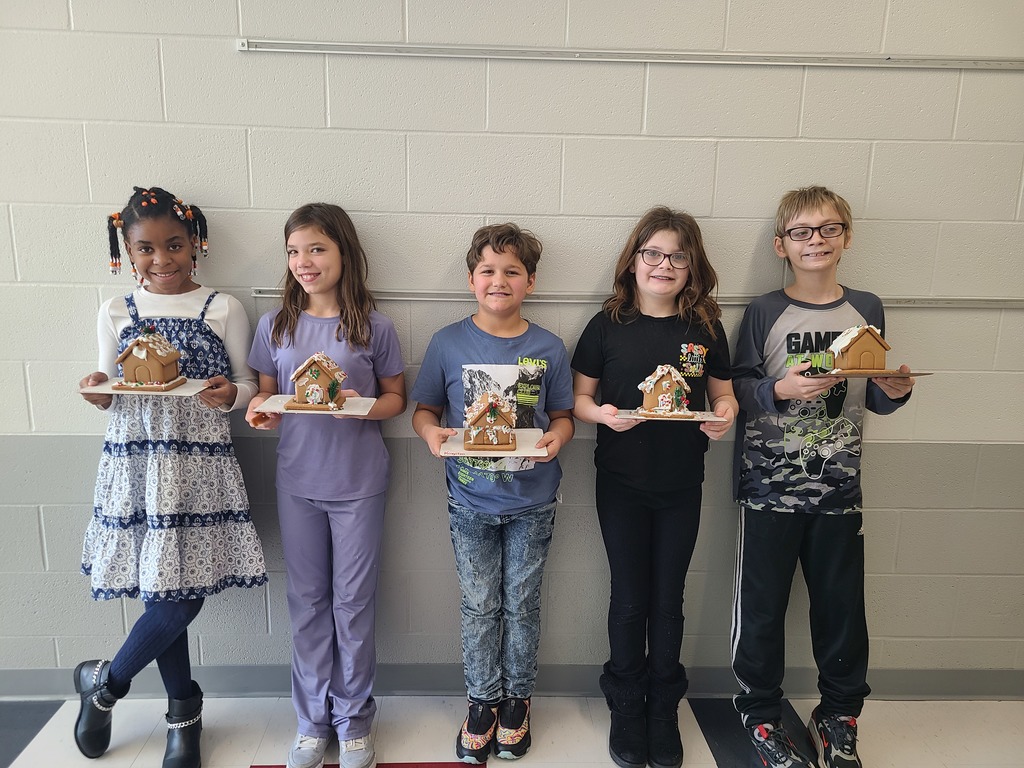 students with gingerbread houses