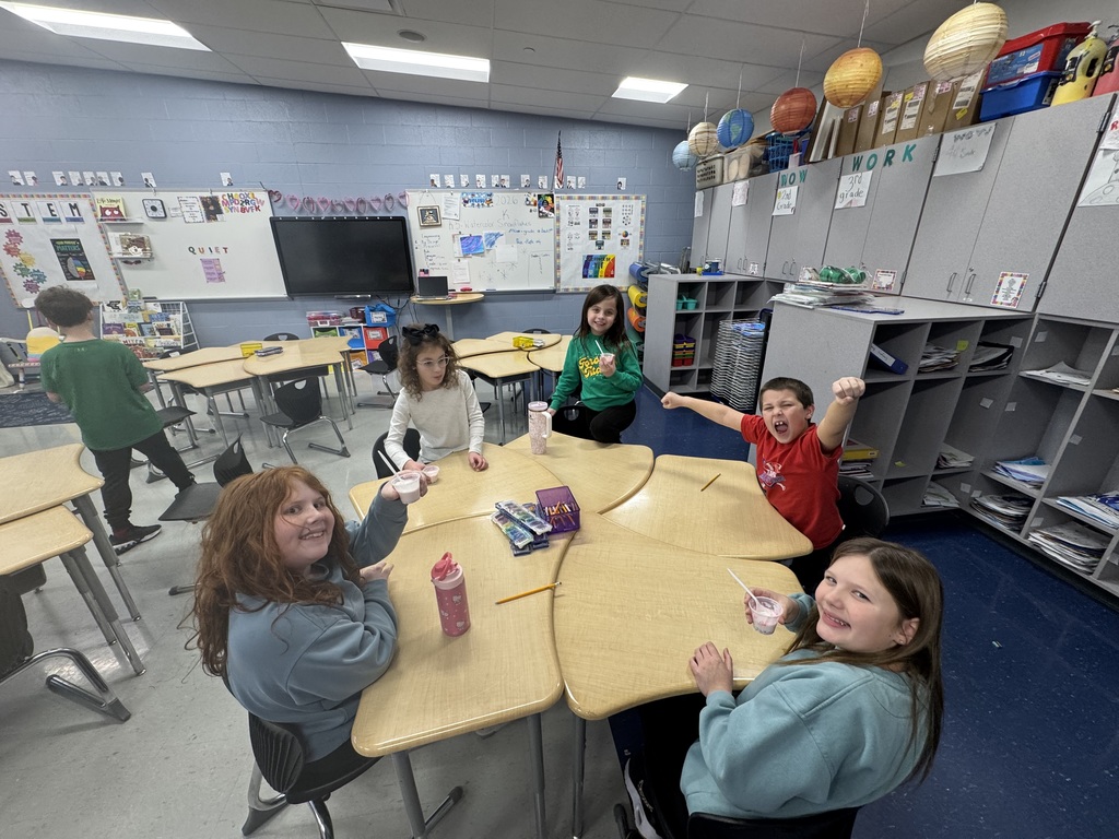3rd grade students enjoying the icecream they made in a bag