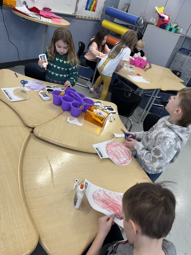 students working on love monsters 