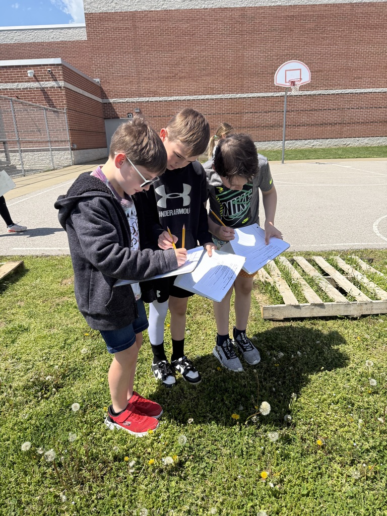 kids writing outside